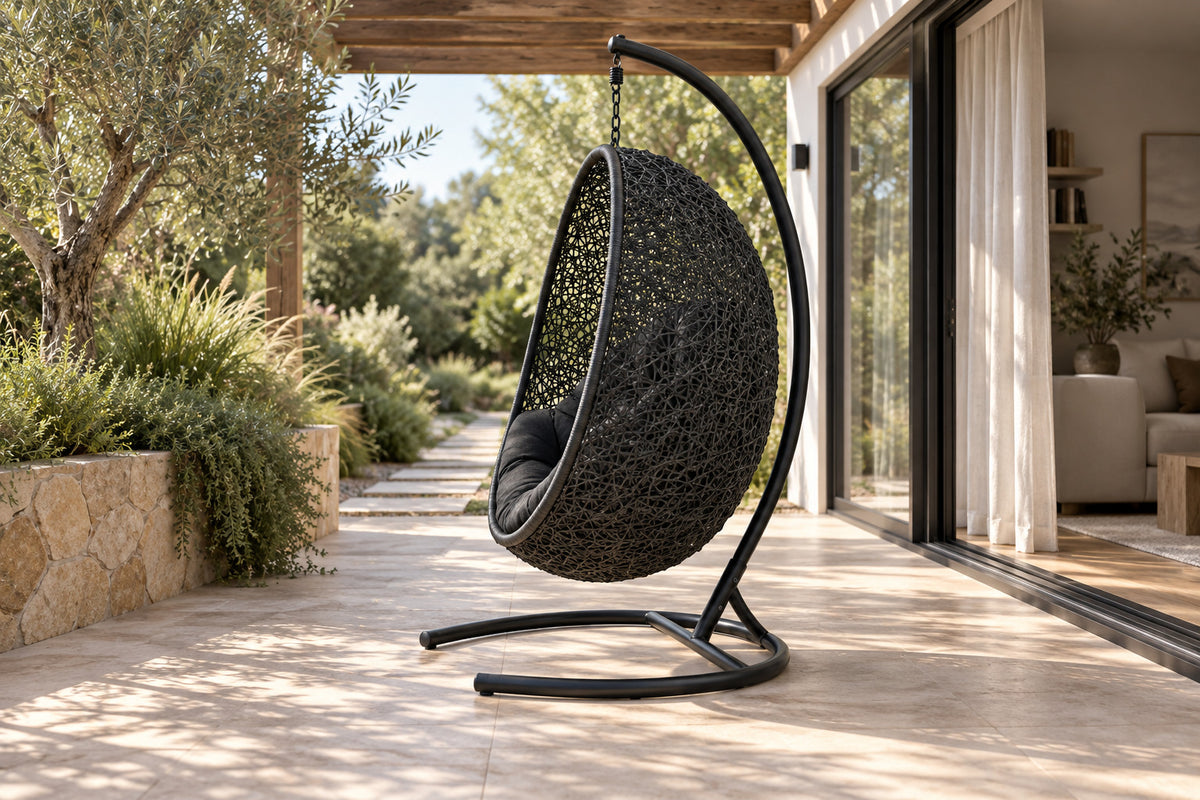 Nido Hanging Chair with Stand, low near-side-profile lifestyle view