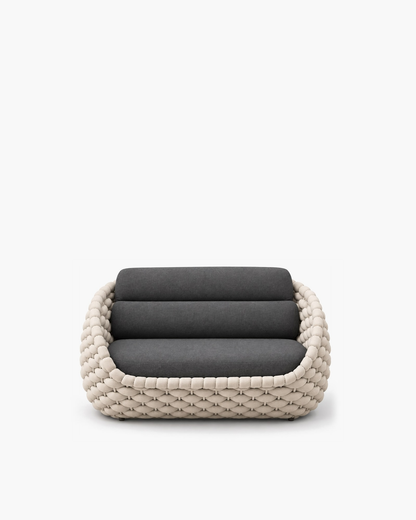 Cala 145 cm pale looped-rope sofa with continuous charcoal cushions, studio view