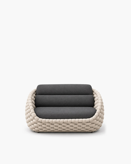 Cala 145 cm pale looped-rope sofa with continuous charcoal cushions, studio view