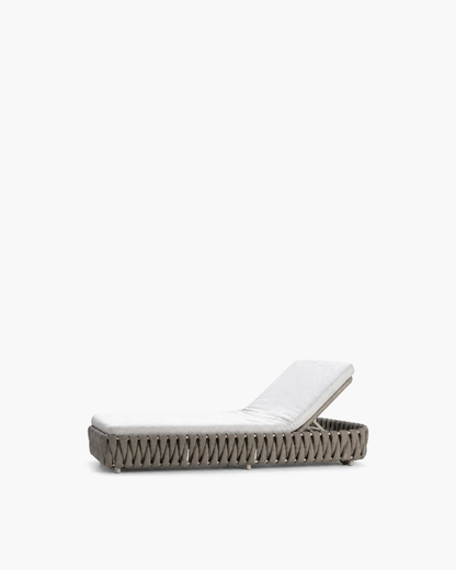Linosa grey strap-woven sun lounger with a white adjustable mattress, studio view