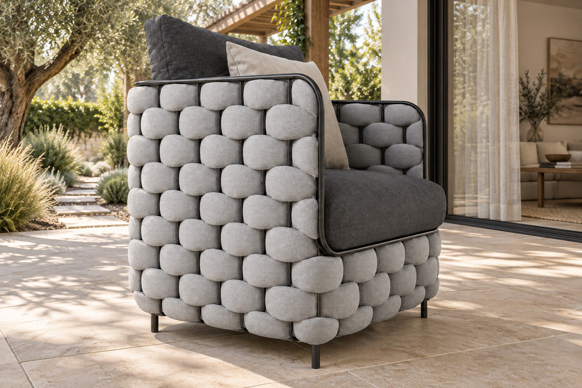 Bodrum Lounge Chair, low near-side-profile lifestyle view