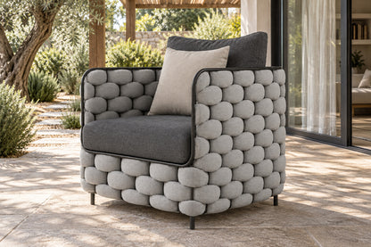 Bodrum Lounge Chair, front-right three-quarter lifestyle view