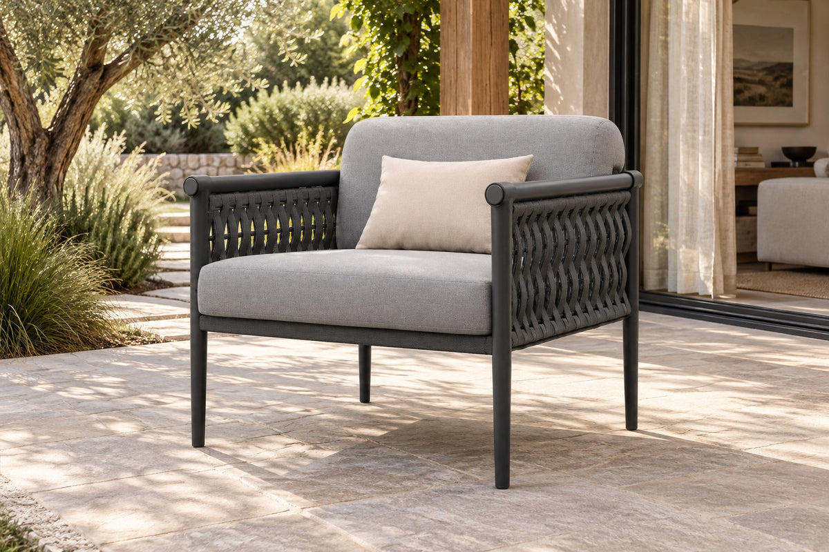 Formentera Lounge Chair, front-right three-quarter lifestyle view