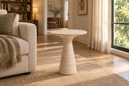 Gio Stone Round Side Table, front-right three-quarter lifestyle view