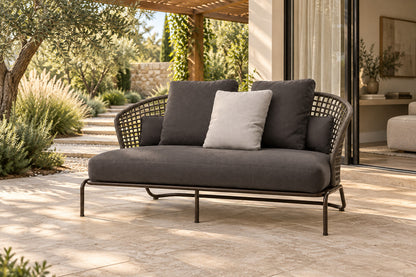 Ischia Two-Seat Sofa, front-right three-quarter lifestyle view