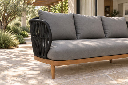 Menorca Sofa, low near-side-profile lifestyle view
