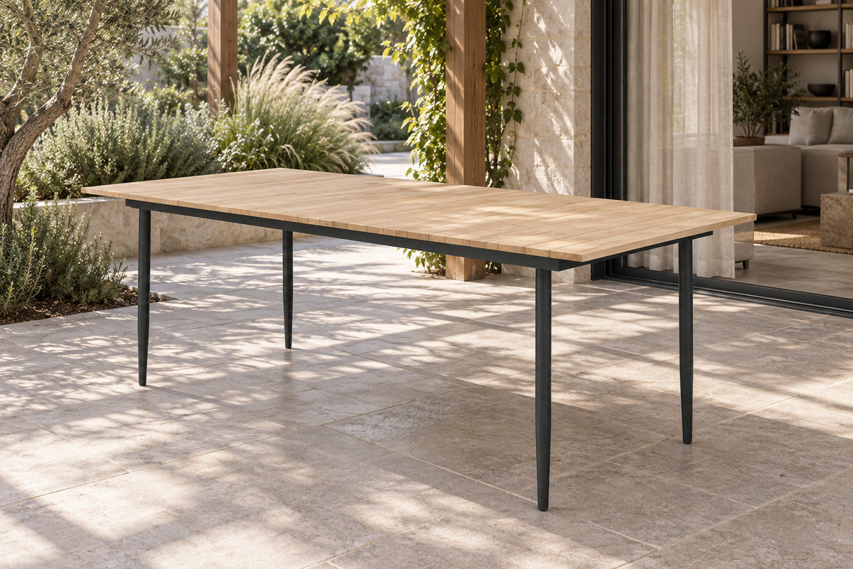 Naxos Dining Table, front-right three-quarter lifestyle view