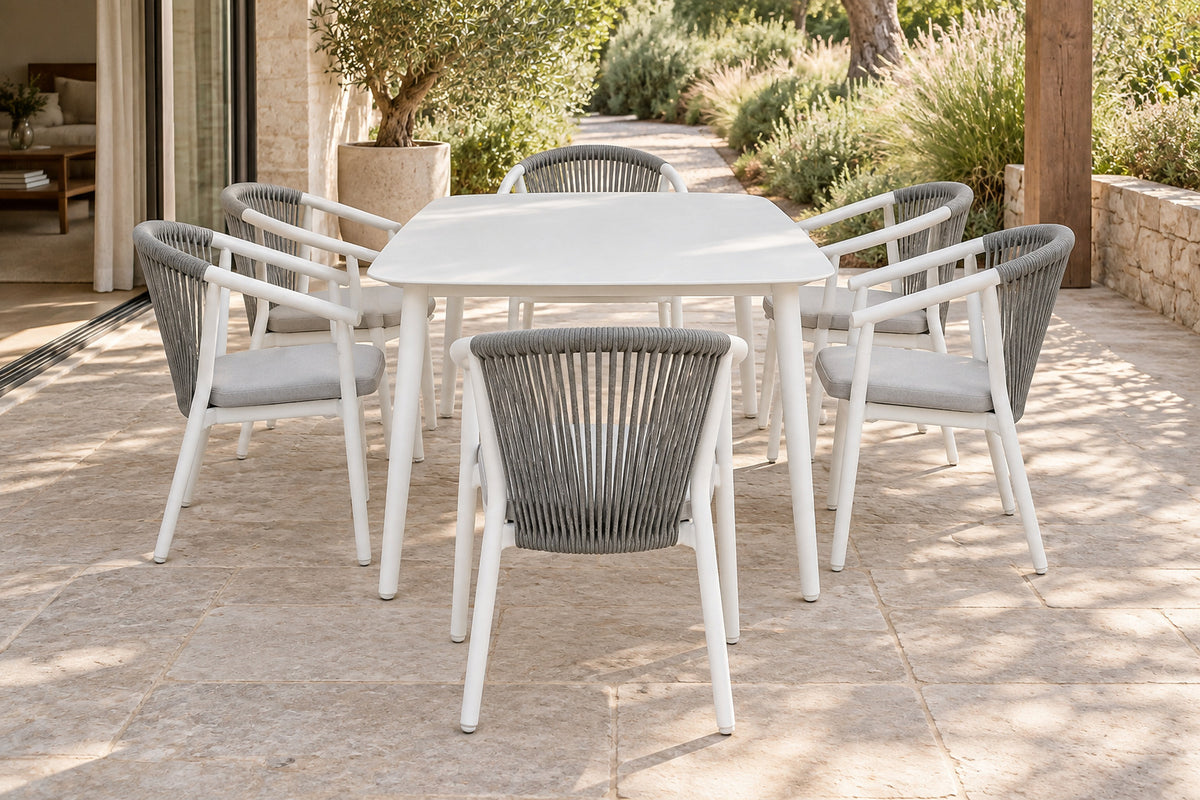 Paros Outdoor Dining Set, low near-side-profile lifestyle view