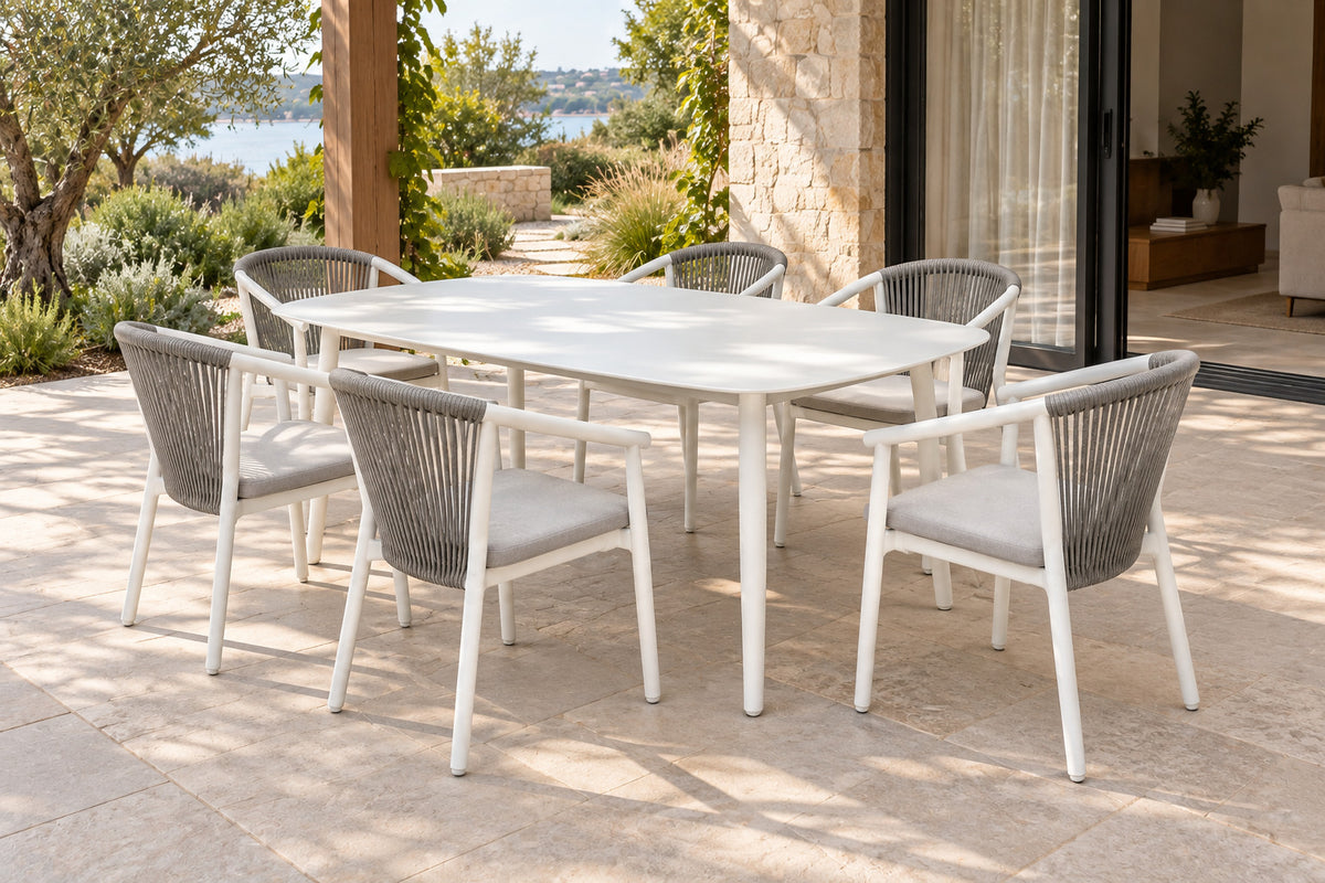 Paros Outdoor Dining Set, front-right three-quarter lifestyle view