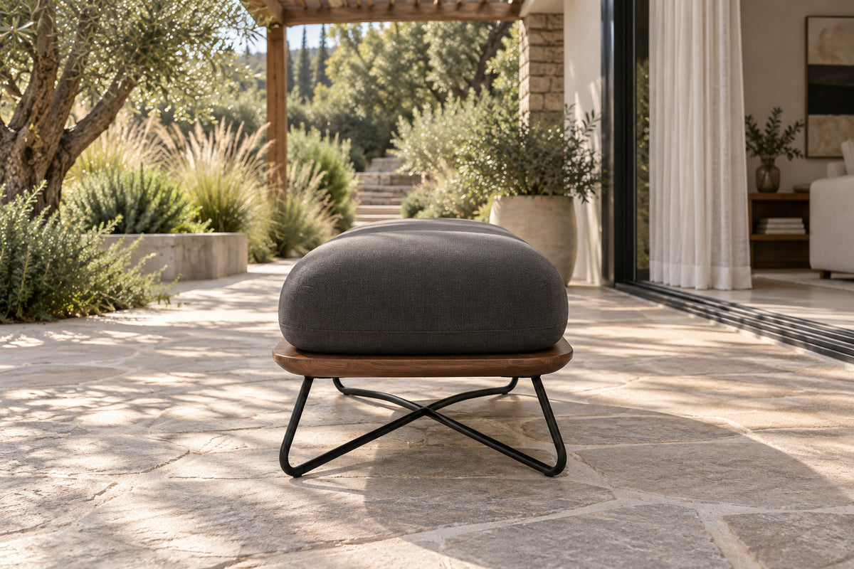 Positano Ottoman, low near-side-profile lifestyle view