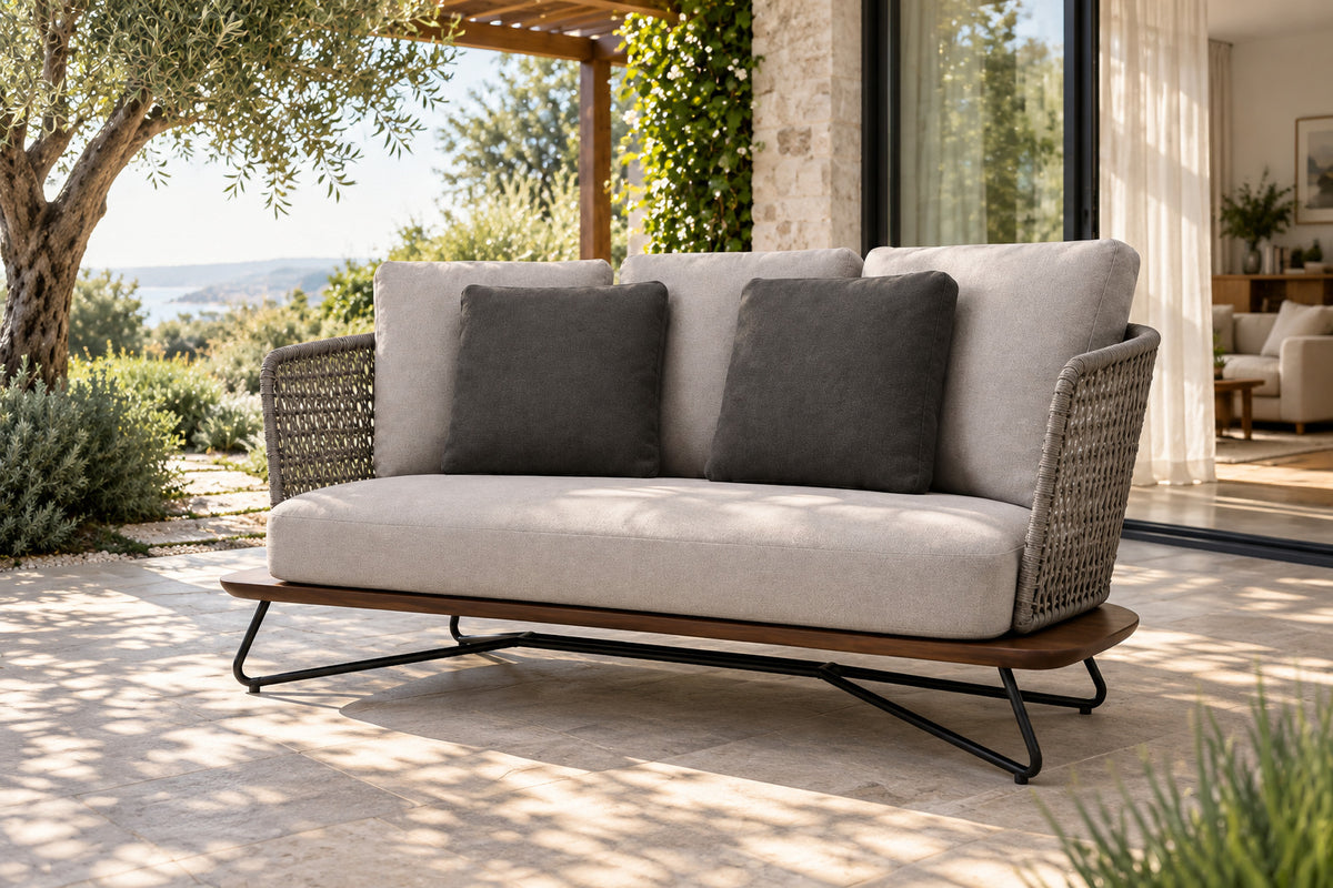 Positano Two-Seat Sofa, front-right three-quarter lifestyle view