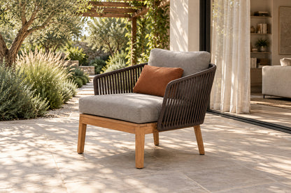 Puglia Lounge Chair, front-right three-quarter lifestyle view