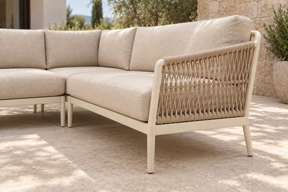 Vela Outdoor Sofa Set in Aluminium, low near-side-profile lifestyle view