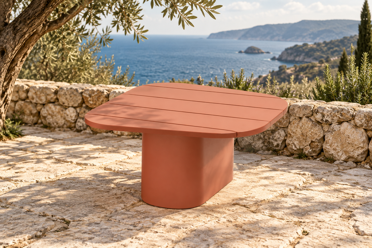 Lifestyle view: Aria aluminium side table on a coastal stone terrace