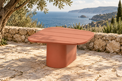 Lifestyle view: Aria aluminium side table on a coastal stone terrace