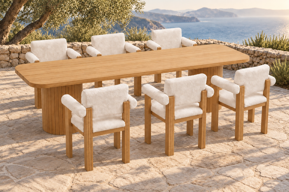 Lifestyle view: Ethereal teak dining table and six upholstered chairs overlooking a coastal bay