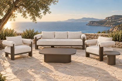 Lifestyle view: five-piece Ethereal aluminium sofa set on a coastal terrace