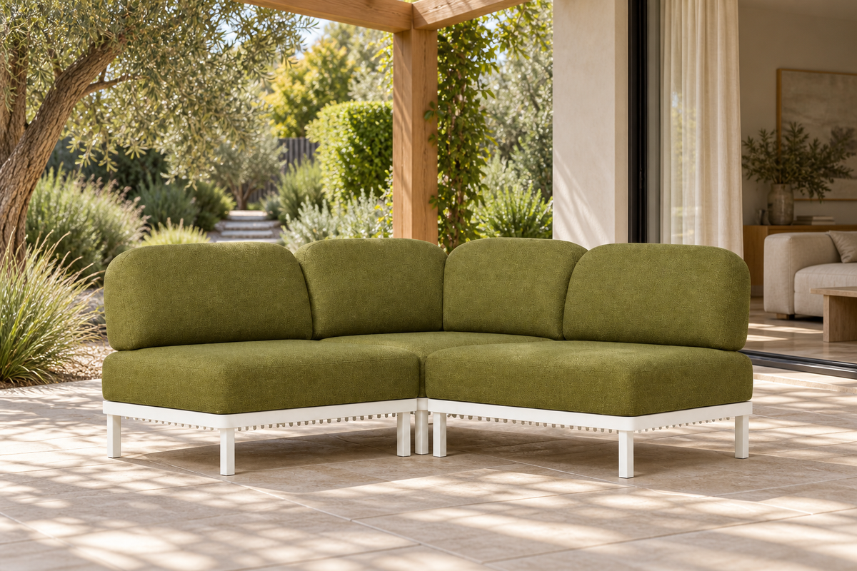 Lifestyle view: Luna modular corner sofa in aluminium on a garden terrace beside an open living room.