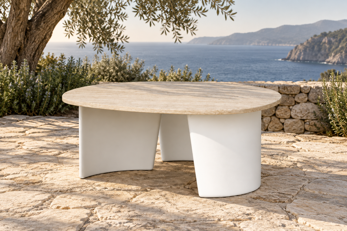 Lifestyle view: Luna aluminium side table with a round stone top on a coastal terrace