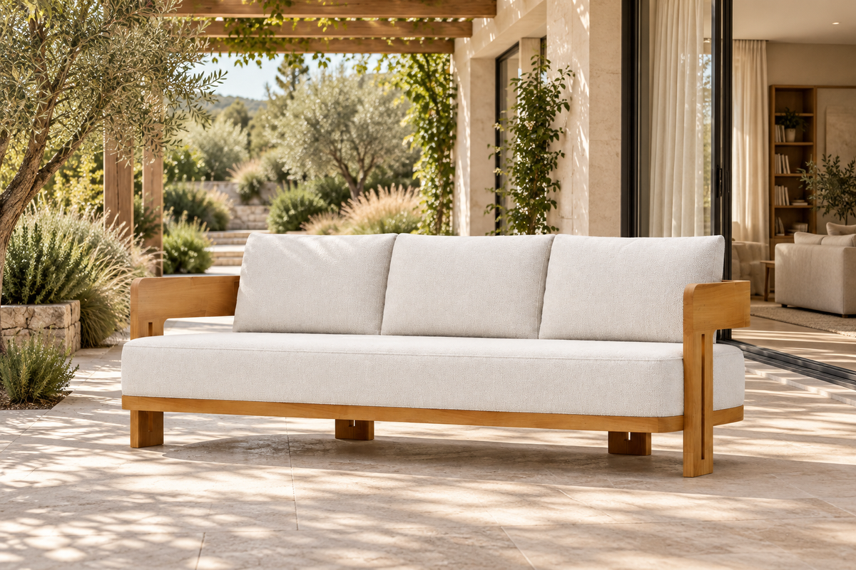 Lifestyle view: Serein teak sofa on a planted garden terrace