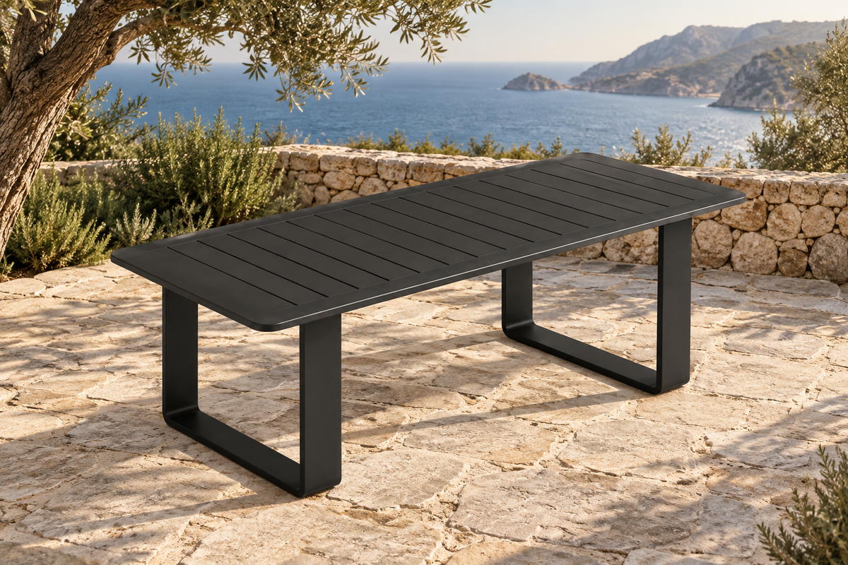 Lifestyle view: Zenia aluminium dining table overlooking the coast