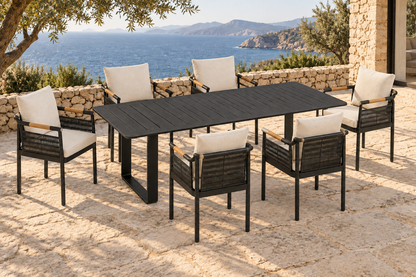 Lifestyle view: Zenia aluminium outdoor dining set on a coastal terrace