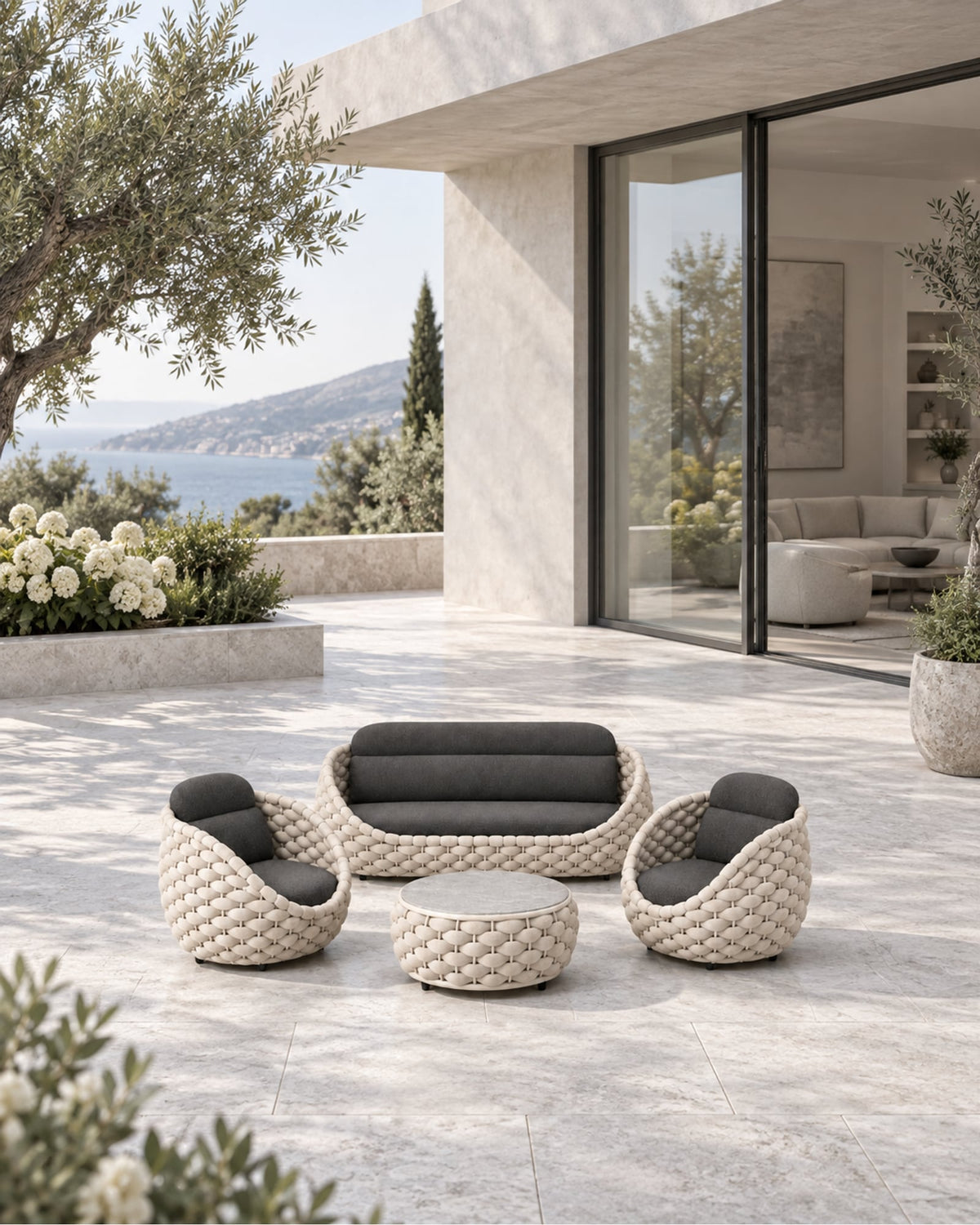 Cala Outdoor Sofa Set in a styled setting