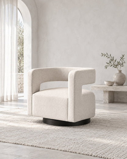 Drew Curved Swivel Chair in a styled setting