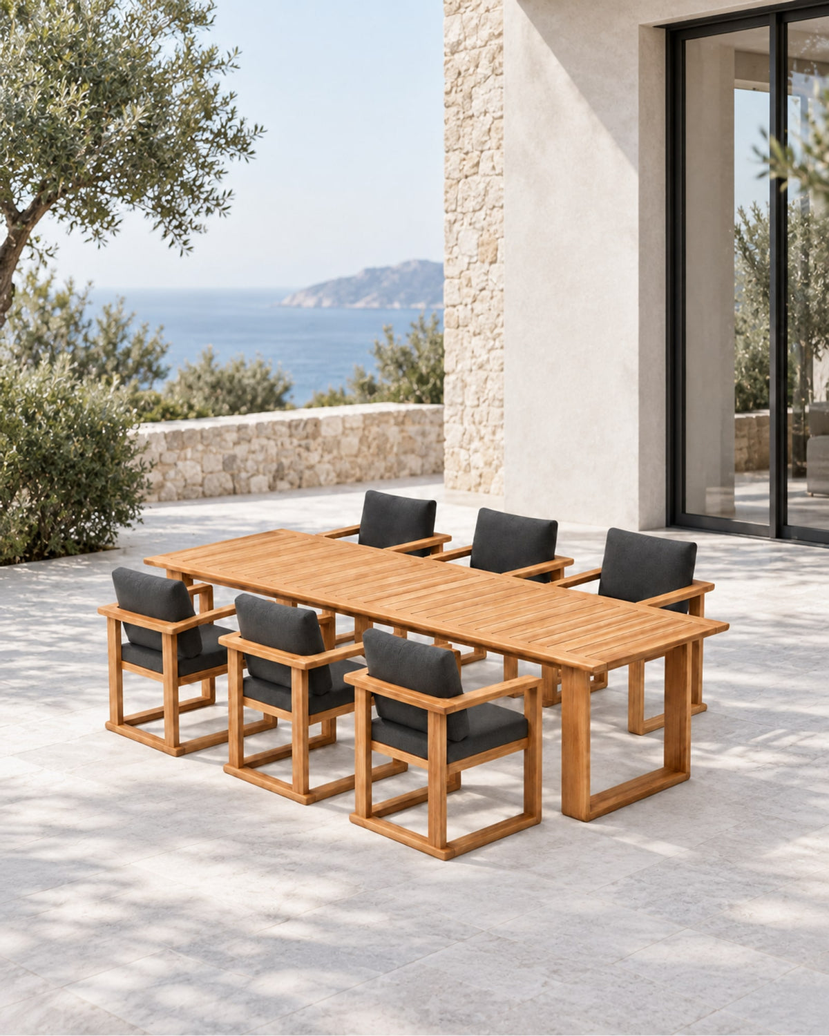 Grace Outdoor Dining Set in Teak in a styled setting