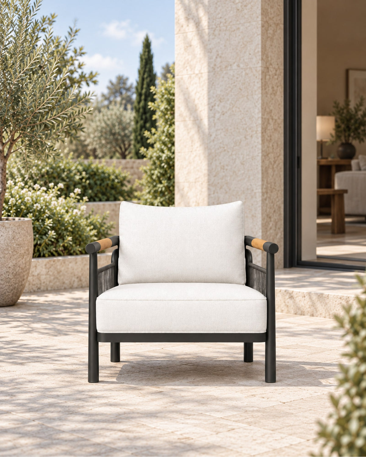Zenia Lounge Chair in Aluminium in a styled setting