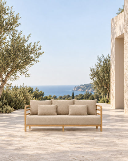 Vela Sofa in Teak in a styled setting