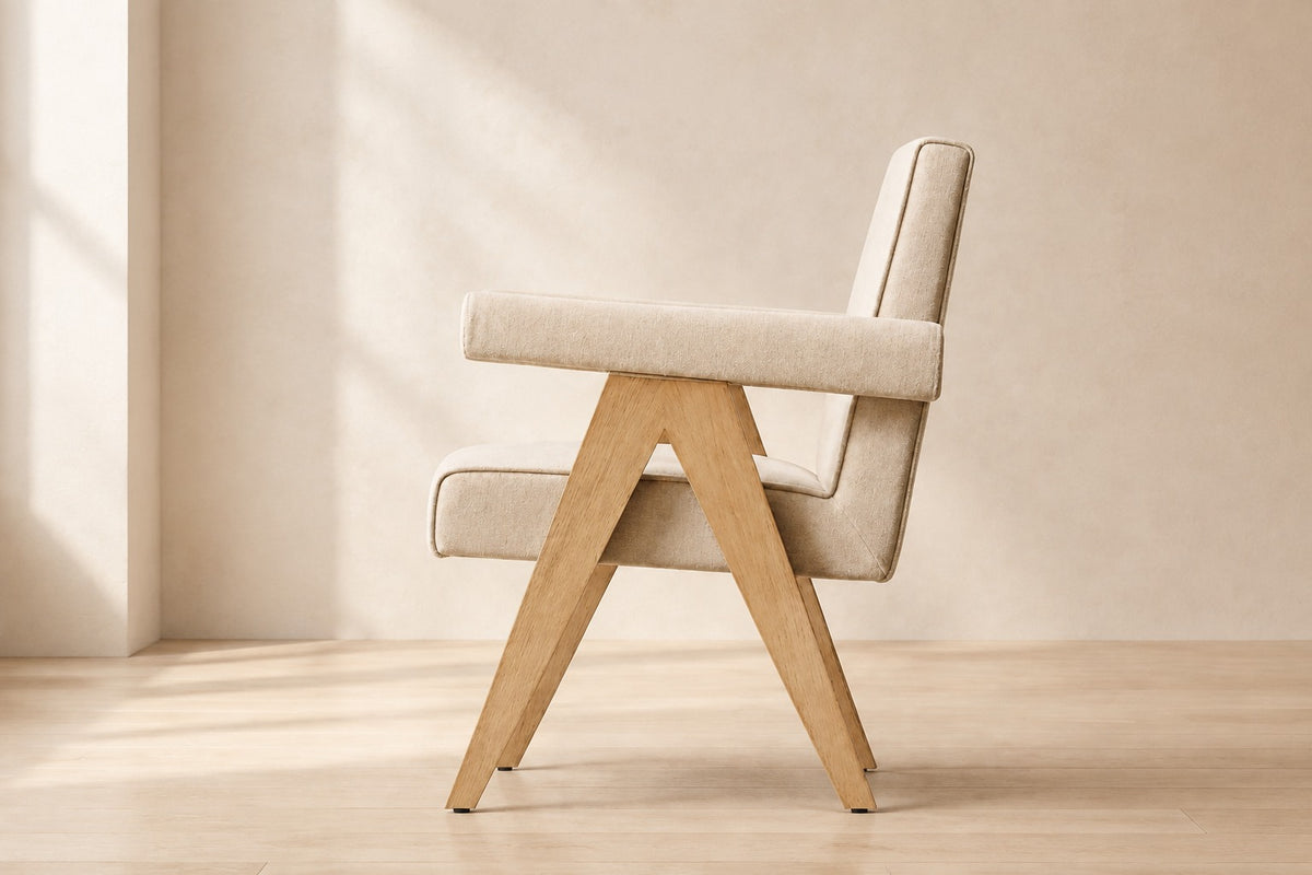 Jakob Fabric Dining Armchair, photographed in a quiet interior