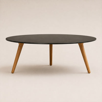 Marisol 90 cm coffee table with dark solid circular top and three timber legs, side view