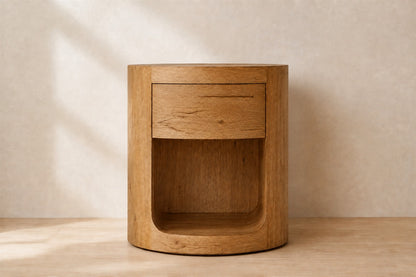 Oslo Round Nightstand, photographed in a quiet bedroom