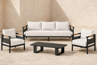 Zenia Outdoor Sofa Set in Aluminium, photographed in a quiet outdoor courtyard