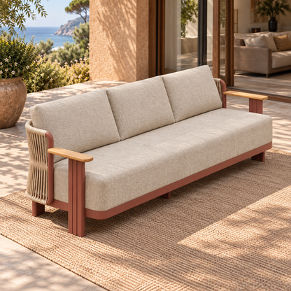 Lifestyle view: Aria aluminium sofa on a coastal stone terrace