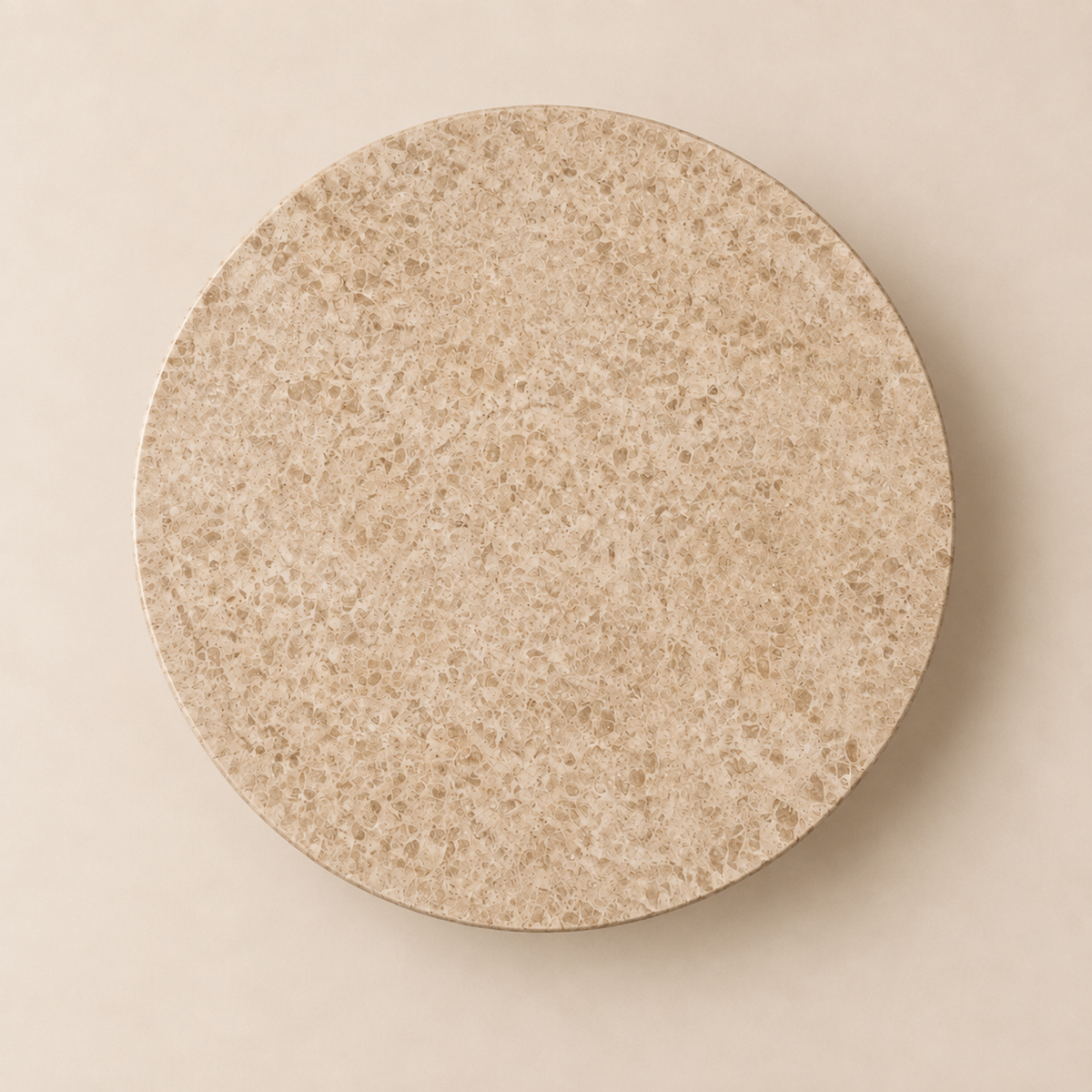 Cellini Round Dining Table in cream marble, complete circular tabletop viewed from above