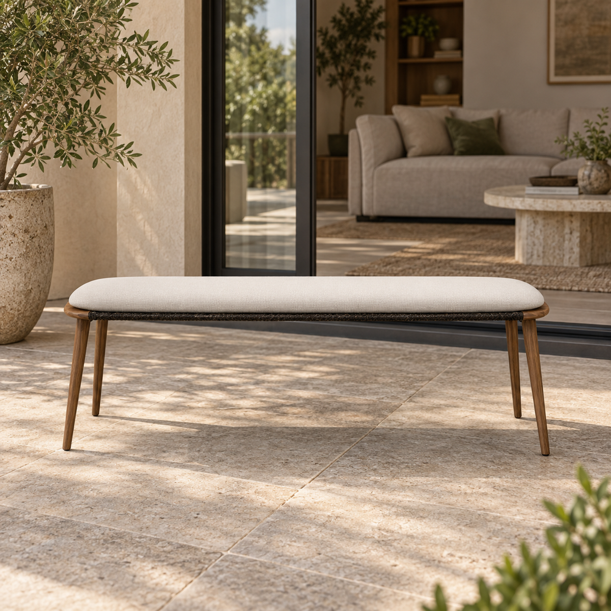 Lifestyle view: Estoril Settee, photographed in a quiet outdoor courtyard