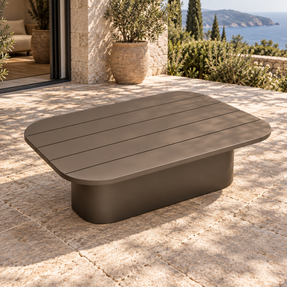 Lifestyle view: Ethereal Coffee Table in Aluminium, elevated opposite diagonal on a furnished home terrace
