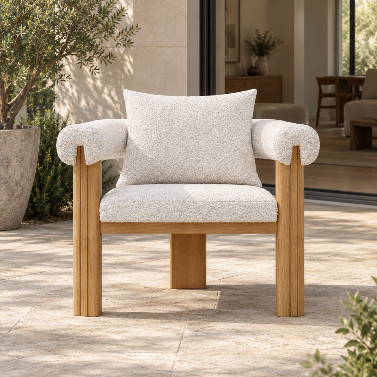 Ethereal teak dining chair, straight front on a furnished terrace
