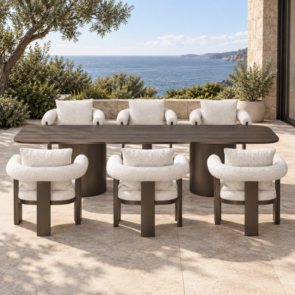 Lifestyle view: Ethereal Outdoor Dining Set in Aluminium, straight frontal view on a coastal terrace