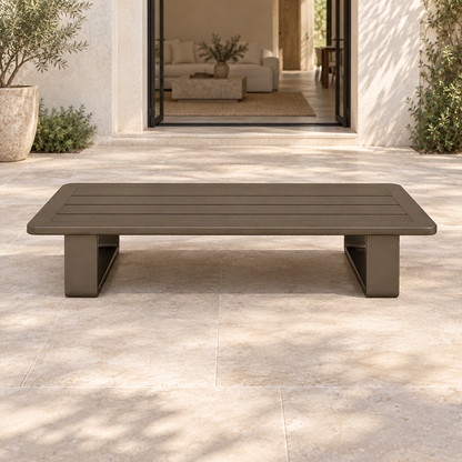 Grace aluminium coffee table, front view on a furnished home terrace
