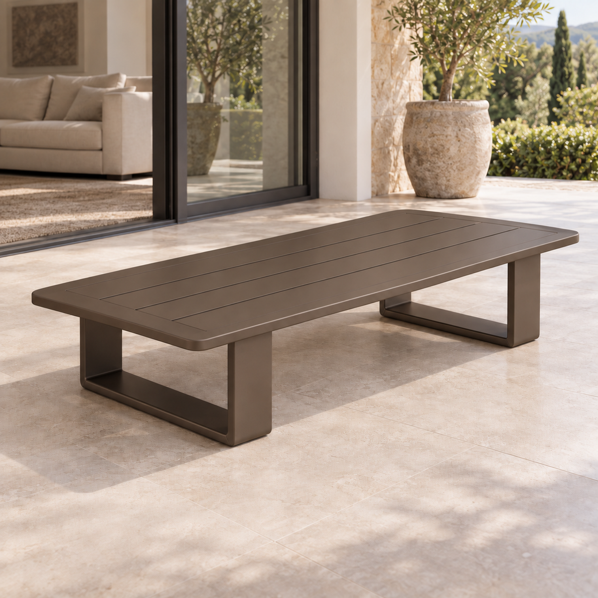 Lifestyle view: Grace aluminium coffee table, left diagonal view on a furnished home terrace
