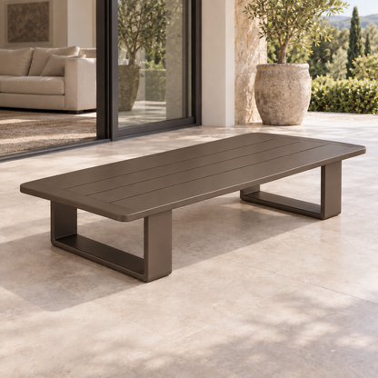 Lifestyle view: Grace aluminium coffee table, left diagonal view on a furnished home terrace