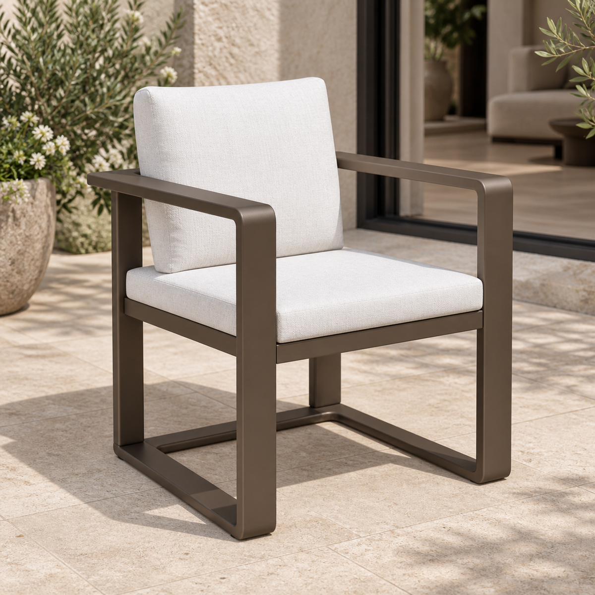 Grace aluminium dining chair, opposite left diagonal beside a furnished terrace