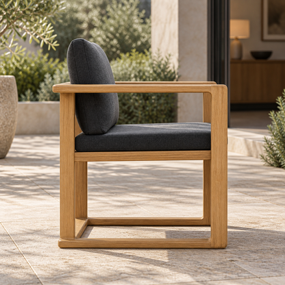 Grace Dining Chair in Teak, side profile on a furnished home terrace