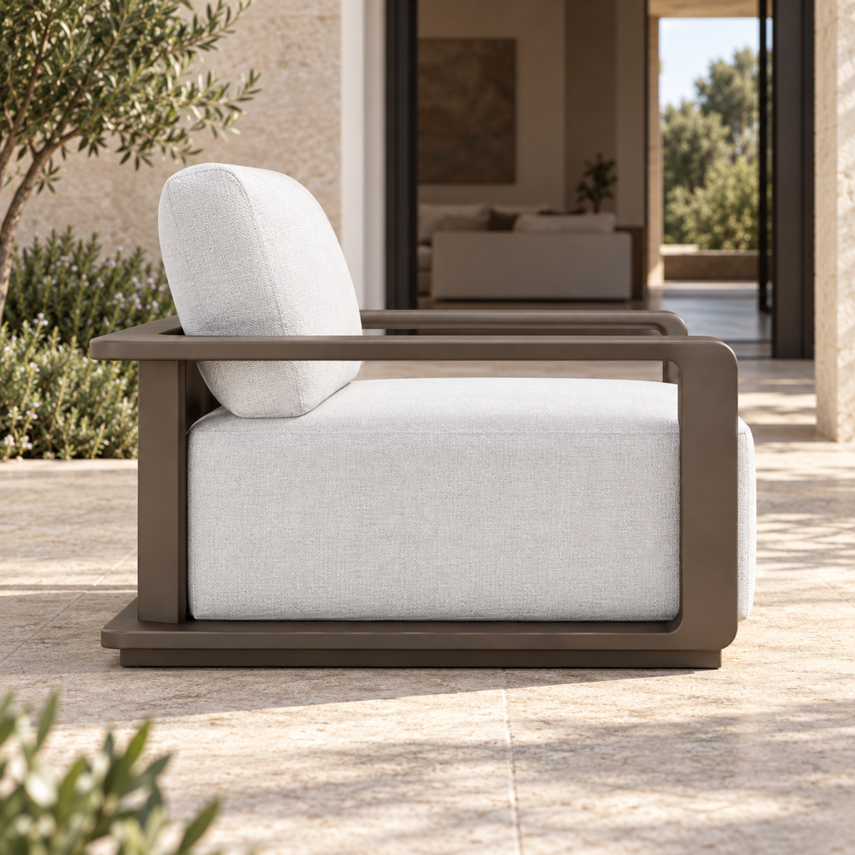 Grace aluminium lounge chair, side view on a furnished home terrace
