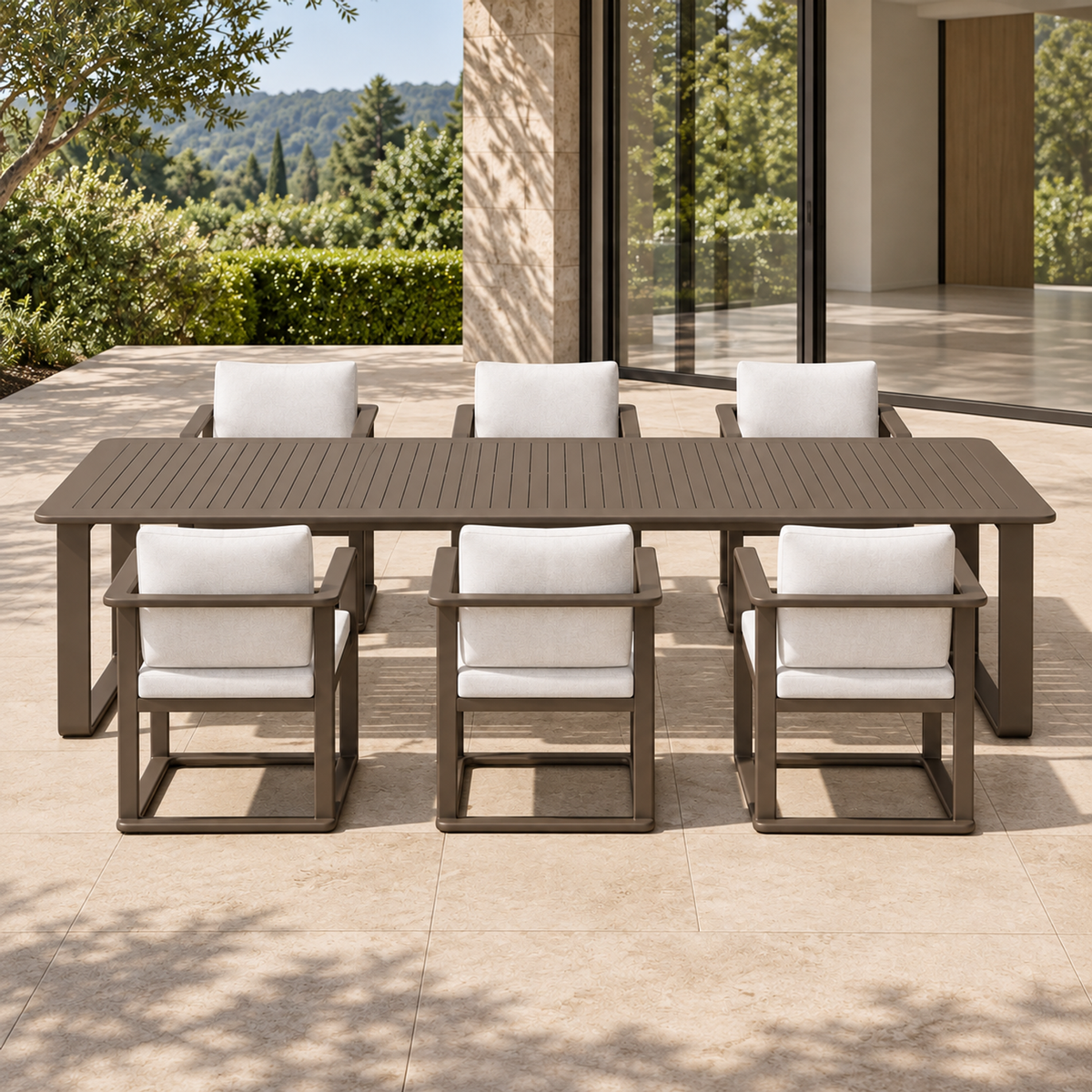Grace aluminium dining table and six chairs, centred long-side view on a home terrace