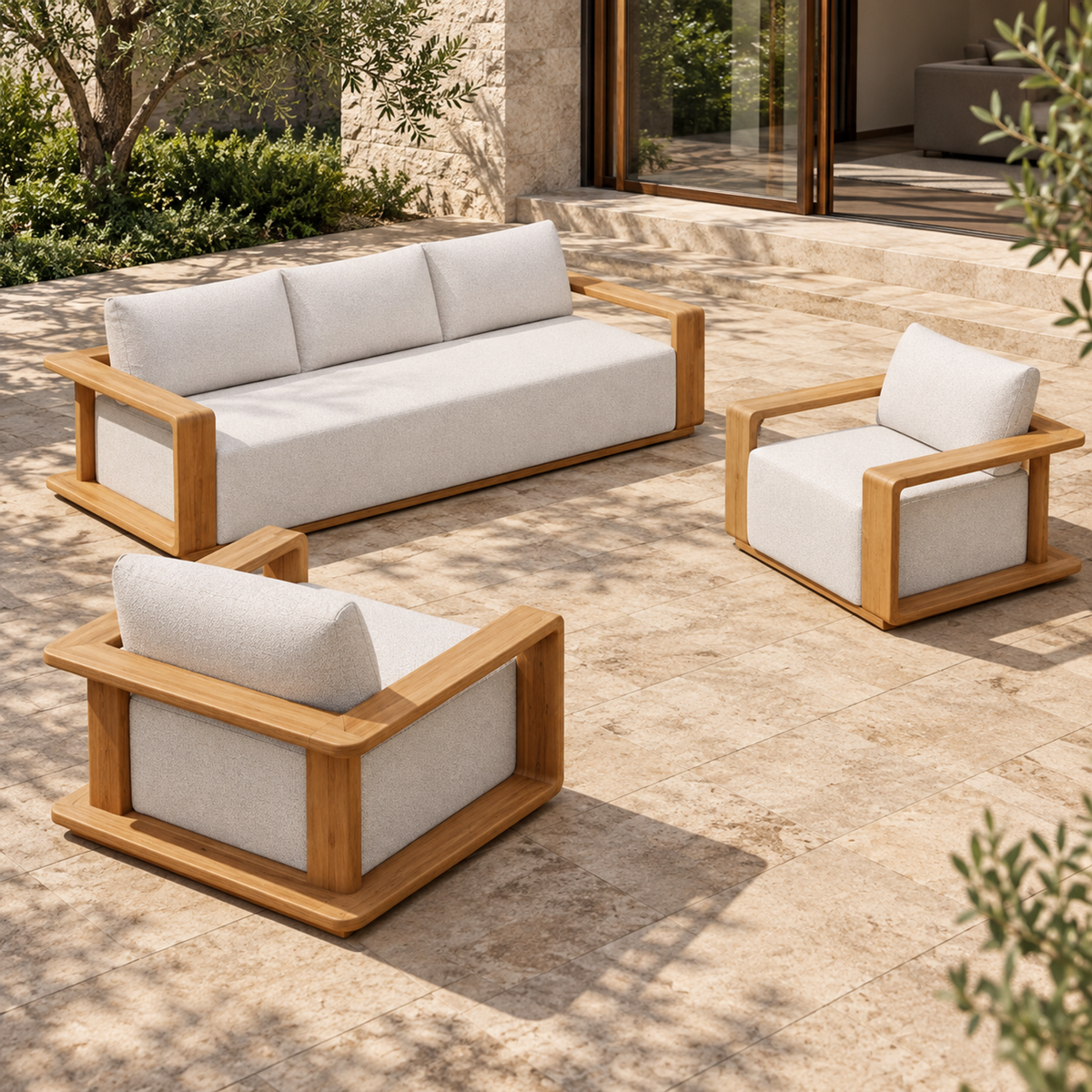 Lifestyle view: Grace Outdoor Sofa Set in Teak, elevated left diagonal showing the chair back
