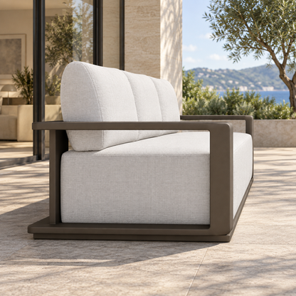 Grace aluminium sofa, left end view on a furnished home terrace